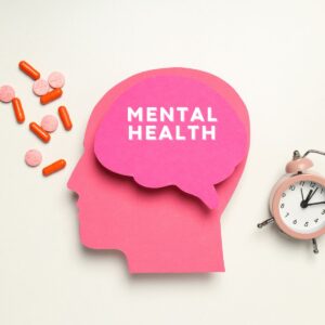 mental health with a clock and probiotic capsules