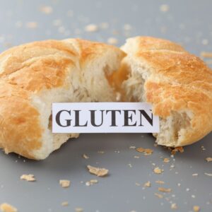 bread cut in half with a paper inside labeled gluten