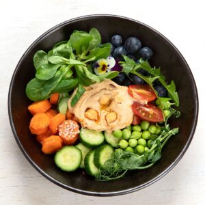 Mediterranean meal plate vegetables hummus