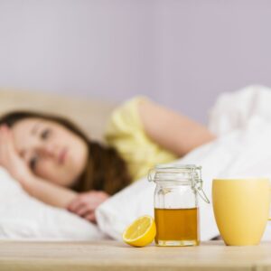 sick woman and herbal teas with natural remedies for boosting immunity