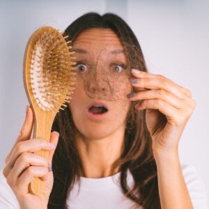 hair loss in a hair brush of a young woman insulin resistance symptoms