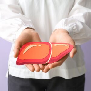 liver detox in woman hands