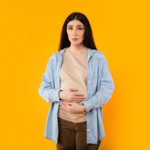woman gut health bloating and constipation